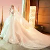 Audrey Hepburn Style Champagne Wedding Dresses 2019 Ball Gown See-through Scoop Neck Lace Appliques 3/4 Sleeve Backless Cascading Ruffles Royal Train