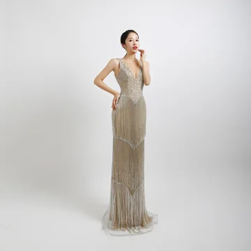 Haut De Gamme Argenté Robe De Soirée 2020 Trompette Sirène Transparentes V Cou Sans Manches Perlage Gland Paillettes Longue Dos Nu Robe De Ceremonie