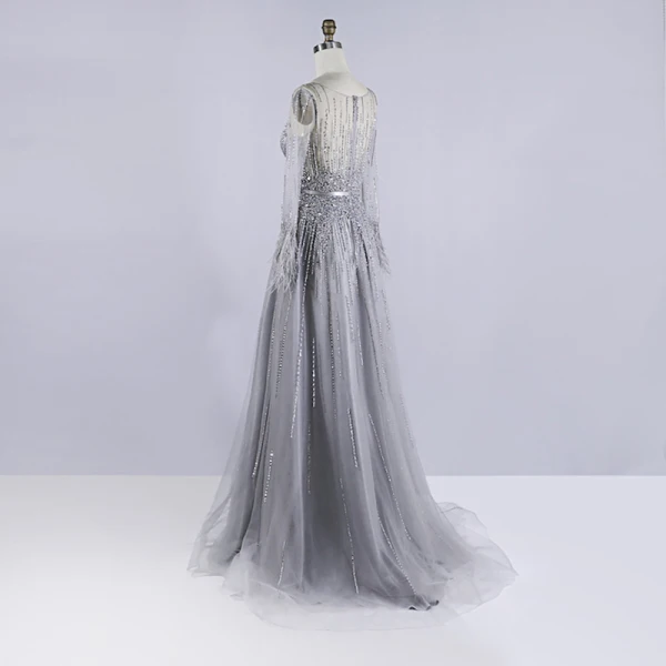 Haut de Gamme Gris Robe De Soirée 2020 Princesse Transparentes Encolure Dégagée Manches Longues Plumes Ceinture Perlage Paillettes Train De Balayage Volants Robe De Ceremonie