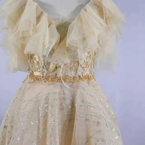 Meilleur Champagne Robe De Bal 2020 Princesse Bretelles Spaghetti Sans Manches Perlage Paillettes Train De Balayage Volants Dos Nu Robe De Ceremonie