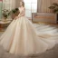 Meilleur La Mariée Champagne Transparentes Robe De Mariée 2020 Robe Boule Encolure Dégagée Sans Manches Dos Nu Perlage Glitter Tulle Cathedral Train Volants