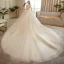 Meilleur La Mariée Champagne Transparentes Robe De Mariée 2020 Robe Boule Encolure Dégagée Sans Manches Dos Nu Perlage Glitter Tulle Cathedral Train Volants