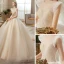 Meilleur La Mariée Champagne Transparentes Robe De Mariée 2020 Robe Boule Encolure Dégagée Sans Manches Dos Nu Perlage Glitter Tulle Cathedral Train Volants