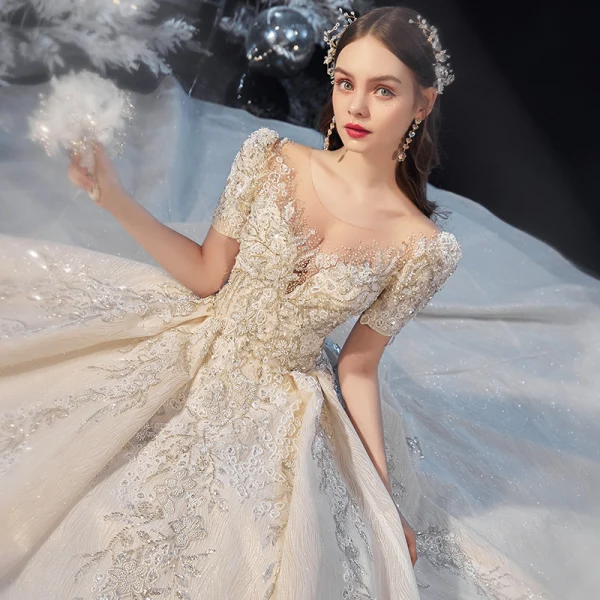 Vintage / Retro Champagne See-through Bridal Wedding Dresses 2020 Ball Gown Scoop Neck Short Sleeve Backless Handmade Beading Glitter Tulle Cathedral Train Ruffle