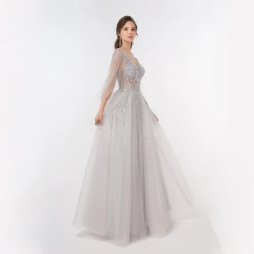 Illusion Lyx Silver Dansande Balklänningar 2020 Prinsessa Djup V Hals Beading Paljetter Långa Ruffle Halterneck Formella Klänningar