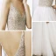 Charmant Ivory / Creme Strand Sommer Brautkleider / Hochzeitskleider 2020 A Linie Spaghettiträger V-Ausschnitt Ärmellos Rückenfreies Perlenstickerei Kapelle-Schleppe Rüschen