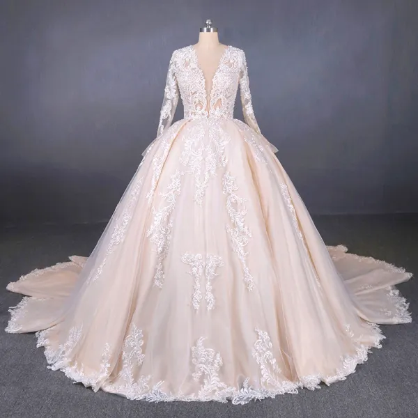 Illusion Champagne See-through Bridal Wedding Dresses 2020 Ball Gown Deep V-Neck Long Sleeve Backless Appliques Lace Beading Cathedral Train Ruffle