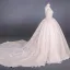 Illusion Champagne See-through Bridal Wedding Dresses 2020 Ball Gown Deep V-Neck Long Sleeve Backless Appliques Lace Beading Cathedral Train Ruffle