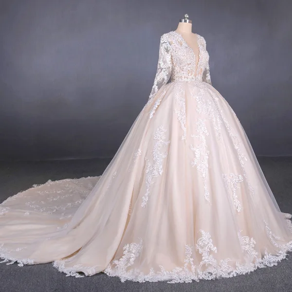 Illusion Champagne See-through Bridal Wedding Dresses 2020 Ball Gown Deep V-Neck Long Sleeve Backless Appliques Lace Beading Cathedral Train Ruffle