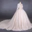Illusion Champagne See-through Bridal Wedding Dresses 2020 Ball Gown Deep V-Neck Long Sleeve Backless Appliques Lace Beading Cathedral Train Ruffle