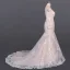 Luxury / Gorgeous Champagne See-through Bridal Wedding Dresses 2020 Trumpet / Mermaid Scoop Neck Long Sleeve Backless Appliques Lace Court Train Ruffle