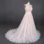 Meilleur Champagne La Mariée Robe De Mariée 2020 Princesse Transparentes Encolure Dégagée Sans Manches Dos Nu Appliques En Dentelle Perlage Glitter Tulle Tribunal Train Volants