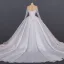 Luxe Ivoire Transparentes La Mariée Robe De Mariée 2020 Robe Boule Encolure Dégagée Manches Longues Fait main Perlage Glitter Tulle Cathedral Train