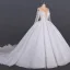 Luxe Ivoire Transparentes La Mariée Robe De Mariée 2020 Robe Boule Encolure Dégagée Manches Longues Fait main Perlage Glitter Tulle Cathedral Train