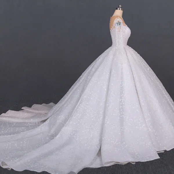 Luxe Ivoire Transparentes La Mariée Robe De Mariée 2020 Robe Boule Encolure Dégagée Manches Longues Fait main Perlage Glitter Tulle Cathedral Train