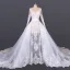 Luxe Blanche Plage Été Transparentes Robe De Mariée 2020 Robe Boule Encolure Dégagée Manches Longues Appliques En Dentelle Cathedral Train Volants