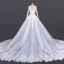 Luxe Blanche Plage Été Transparentes Robe De Mariée 2020 Robe Boule Encolure Dégagée Manches Longues Appliques En Dentelle Cathedral Train Volants