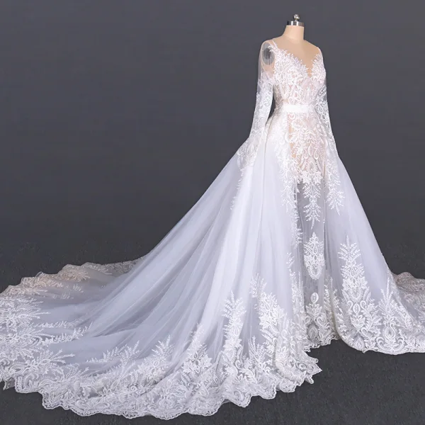 Luxe Blanche Plage Été Transparentes Robe De Mariée 2020 Robe Boule Encolure Dégagée Manches Longues Appliques En Dentelle Cathedral Train Volants