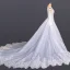 Luxe Blanche Plage Été Transparentes Robe De Mariée 2020 Robe Boule Encolure Dégagée Manches Longues Appliques En Dentelle Cathedral Train Volants
