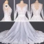 Luxe Blanche Plage Été Transparentes Robe De Mariée 2020 Robe Boule Encolure Dégagée Manches Longues Appliques En Dentelle Cathedral Train Volants