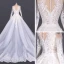 Luxe Blanche Plage Été Transparentes Robe De Mariée 2020 Robe Boule Encolure Dégagée Manches Longues Appliques En Dentelle Cathedral Train Volants