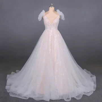 Haut De Gamme Champagne La Mariée Robe De Mariée 2020 Robe Boule Épaules Noeud V Cou Sans Manches Dos Nu Appliques En Dentelle Perlage Glitter Tulle Tribunal Train Volants