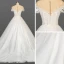 Elegant Ivory Bridal Wedding Dresses 2020 Ball Gown See-through Scoop Neck Short Sleeve Appliques Lace Sequins Beading Glitter Tulle Chapel Train Ruffle