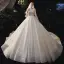 Romantic Champagne Bridal Wedding Dresses 2020 Ball Gown See-through Scoop Neck Long Sleeve Backless Beading Sequins Glitter Tulle Cathedral Train Ruffle