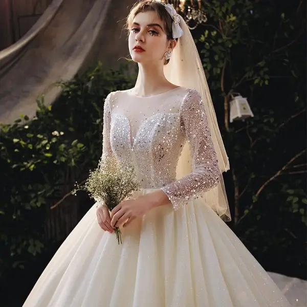 Romantic Champagne Bridal Wedding Dresses 2020 Ball Gown See-through Scoop Neck Long Sleeve Backless Beading Sequins Glitter Tulle Cathedral Train Ruffle