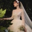 Romantic Champagne Bridal Wedding Dresses 2020 Ball Gown See-through Scoop Neck Long Sleeve Backless Beading Sequins Glitter Tulle Cathedral Train Ruffle
