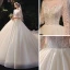 Romantic Champagne Bridal Wedding Dresses 2020 Ball Gown See-through Scoop Neck Long Sleeve Backless Beading Sequins Glitter Tulle Cathedral Train Ruffle
