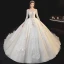 Meilleur Champagne La Mariée Robe De Mariée 2020 Robe Boule Transparentes Encolure Dégagée Manches Longues Dos Nu Appliques En Dentelle Perlage Glitter Tulle Cathedral Train Volants