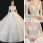 Meilleur Champagne La Mariée Robe De Mariée 2020 Robe Boule Transparentes Encolure Dégagée Manches Longues Dos Nu Appliques En Dentelle Perlage Glitter Tulle Cathedral Train Volants