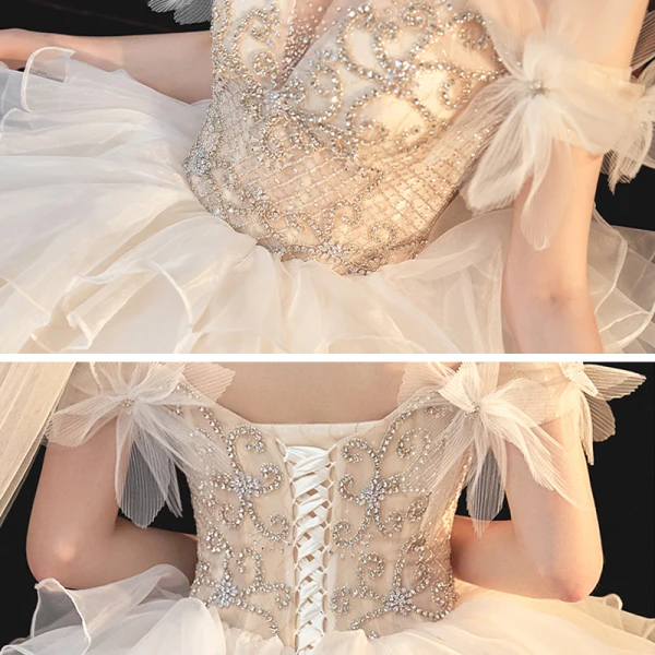 Schöne Champagner Organza Hochzeits Brautkleider / Hochzeitskleider 2020 Ballkleid Off Shoulder Kurze Ärmel Rückenfreies Perlenstickerei Strass Kathedrale Schleppe Rüschen