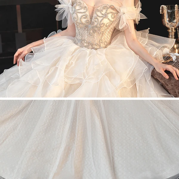 Schöne Champagner Organza Hochzeits Brautkleider / Hochzeitskleider 2020 Ballkleid Off Shoulder Kurze Ärmel Rückenfreies Perlenstickerei Strass Kathedrale Schleppe Rüschen