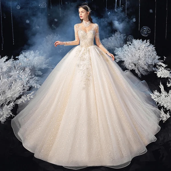 Vintage / Retro Champagne See-through Bridal Wedding Dresses 2020 Ball Gown High Neck Long Sleeve Backless Appliques Beading Glitter Tulle Cathedral Train Ruffle