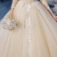 Romantique Champagne La Mariée Robe De Mariée 2020 Robe Boule Transparentes Col Haut 3/4 Manches Dos Nu Appliques En Dentelle Perlage Glitter Tulle Cathedral Train Volants