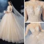 Romantique Champagne La Mariée Robe De Mariée 2020 Robe Boule Transparentes Col Haut 3/4 Manches Dos Nu Appliques En Dentelle Perlage Glitter Tulle Cathedral Train Volants