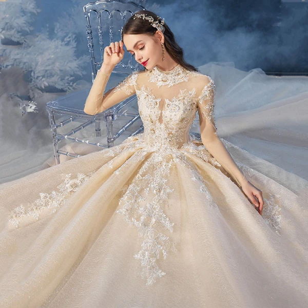 Vintage / Retro Champagne See-through Bridal Wedding Dresses 2020 Ball Gown High Neck Long Sleeve Backless Beading Appliques Lace Glitter Tulle Cathedral Train Ruffle