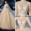 Vintage / Retro Champagne See-through Bridal Wedding Dresses 2020 Ball Gown High Neck Long Sleeve Backless Beading Appliques Lace Glitter Tulle Cathedral Train Ruffle