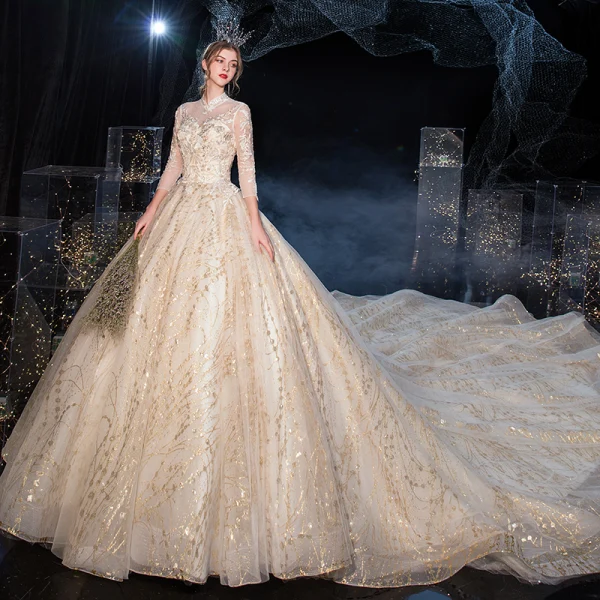 Chinesischer Stil Champagner Durchsichtige Hochzeits Brautkleider / Hochzeitskleider 2020 Ballkleid Stehkragen 3/4 Ärmel Rückenfreies Applikationen Spitze Pailletten Königliche Schleppe Rüschen