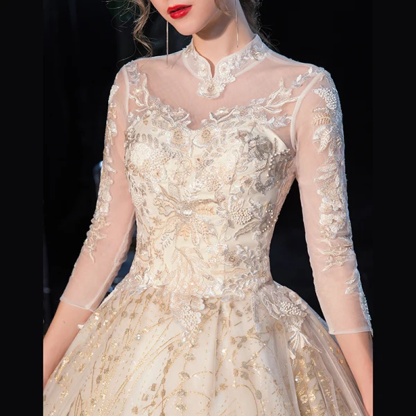 Chinesischer Stil Champagner Durchsichtige Hochzeits Brautkleider / Hochzeitskleider 2020 Ballkleid Stehkragen 3/4 Ärmel Rückenfreies Applikationen Spitze Pailletten Königliche Schleppe Rüschen