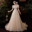 Style Victorien Champagne Jardin / Extérieur Robe De Mariée 2020 Princesse Transparentes Encolure Dégagée Gonflée Manches Courtes Dos Nu Perlage Paillettes Train De Balayage Volants