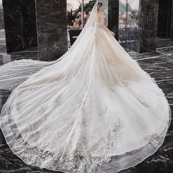 Luxury / Gorgeous Champagne See-through Bridal Wedding Dresses 2020 Ball Gown Scoop Neck Long Sleeve Backless Appliques Flower Beading Glitter Tulle Cathedral Train Ruffle