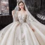 Luxury / Gorgeous Champagne See-through Bridal Wedding Dresses 2020 Ball Gown Scoop Neck Long Sleeve Backless Appliques Flower Beading Glitter Tulle Cathedral Train Ruffle