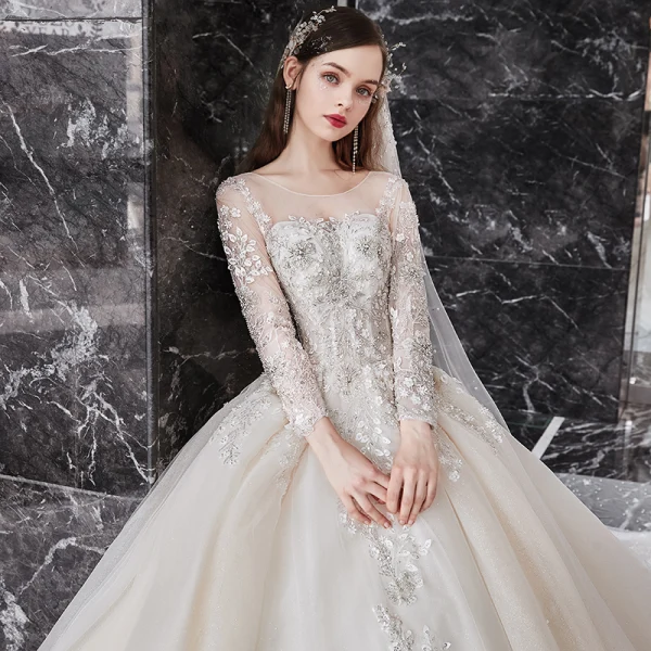 Luxury / Gorgeous Champagne See-through Bridal Wedding Dresses 2020 Ball Gown Scoop Neck Long Sleeve Backless Appliques Flower Beading Glitter Tulle Cathedral Train Ruffle