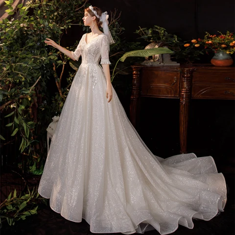 Champán Exterior / Jardín Ligero Vestidos De Novia 2020 A-Line / Princess V-Cuello 1/2 Ærmer Sin Espalda Rebordear Lentejuelas Glitter Tul Colas De Barrido Ruffle