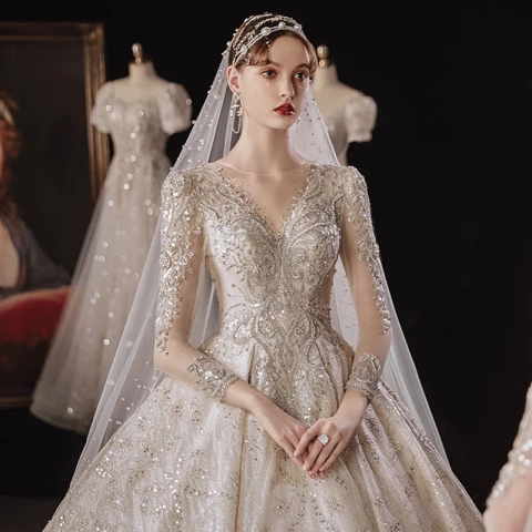 Magnífico Champán Boda Vestidos De Novia 2020 Ball Gown Transparentes Scoop Escote Manga Larga Sin Espalda Rebordear Lentejuelas Glitter Tul Cathedral Train Ruffle