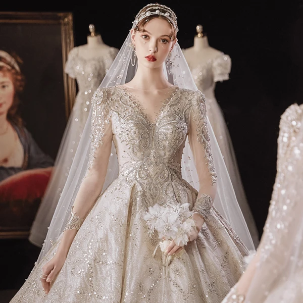 Luxury / Gorgeous Champagne Bridal Wedding Dresses 2020 Ball Gown See-through Scoop Neck Long Sleeve Backless Beading Sequins Glitter Tulle Cathedral Train Ruffle