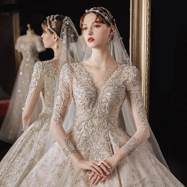Luxury / Gorgeous Champagne Bridal Wedding Dresses 2020 Ball Gown See-through Scoop Neck Long Sleeve Backless Beading Sequins Glitter Tulle Cathedral Train Ruffle